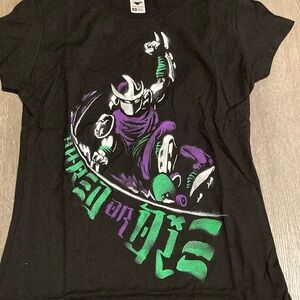 Women Black medium (ninja turtle)shredder, graphic T-shirt.